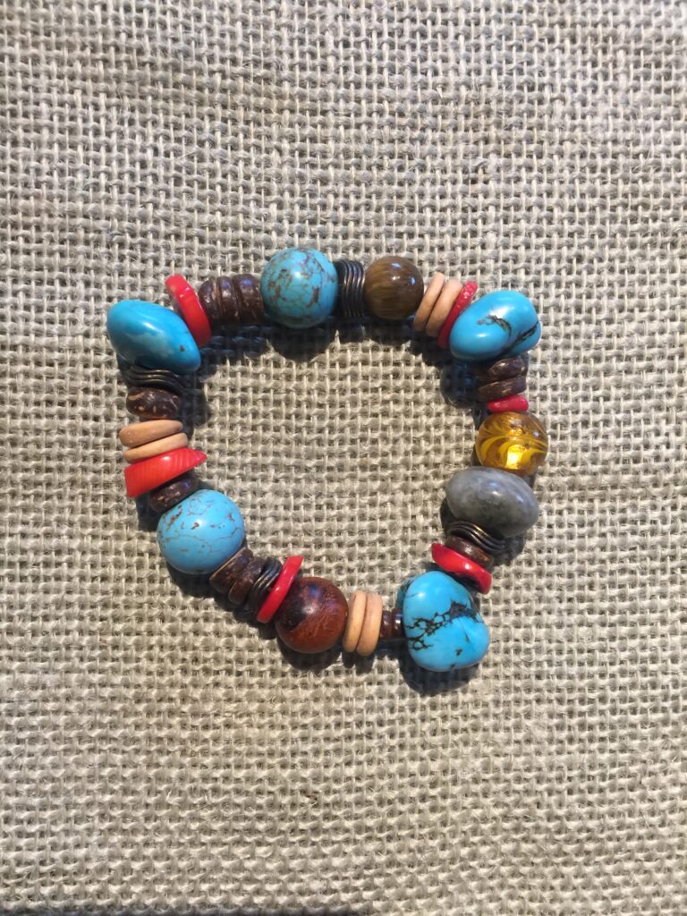 Bracelet 425 with turquoise-colored, red and amber beads